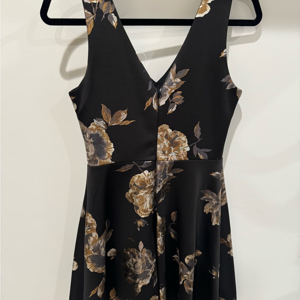 Women’s Aqua dress size medium by Bloomingdale’s never worn.
